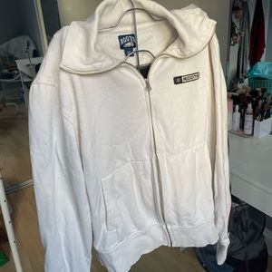 White vintage roots zip up with red and black details